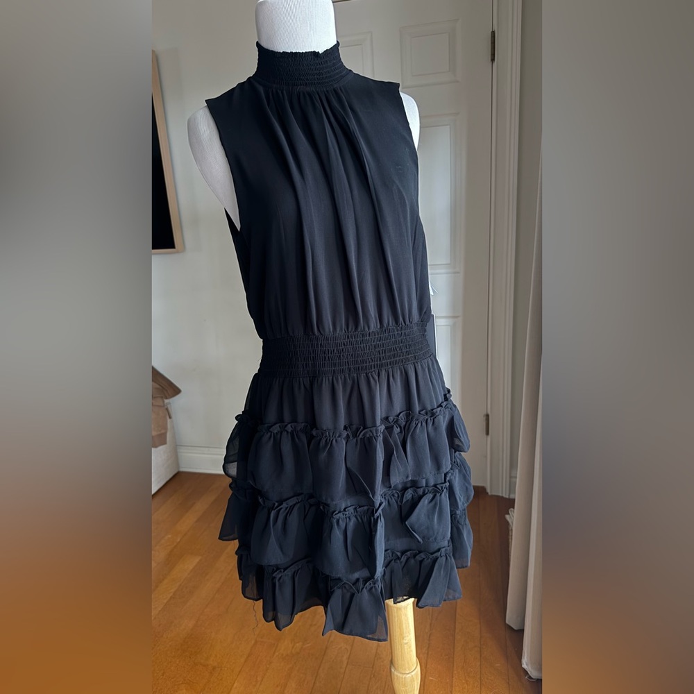 1. STATE
Smocked Mock Neck Blqck Sleeveless Ruffle Tiered Dress